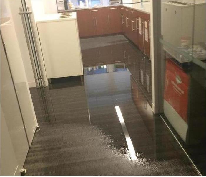 kitchen floor with water on it